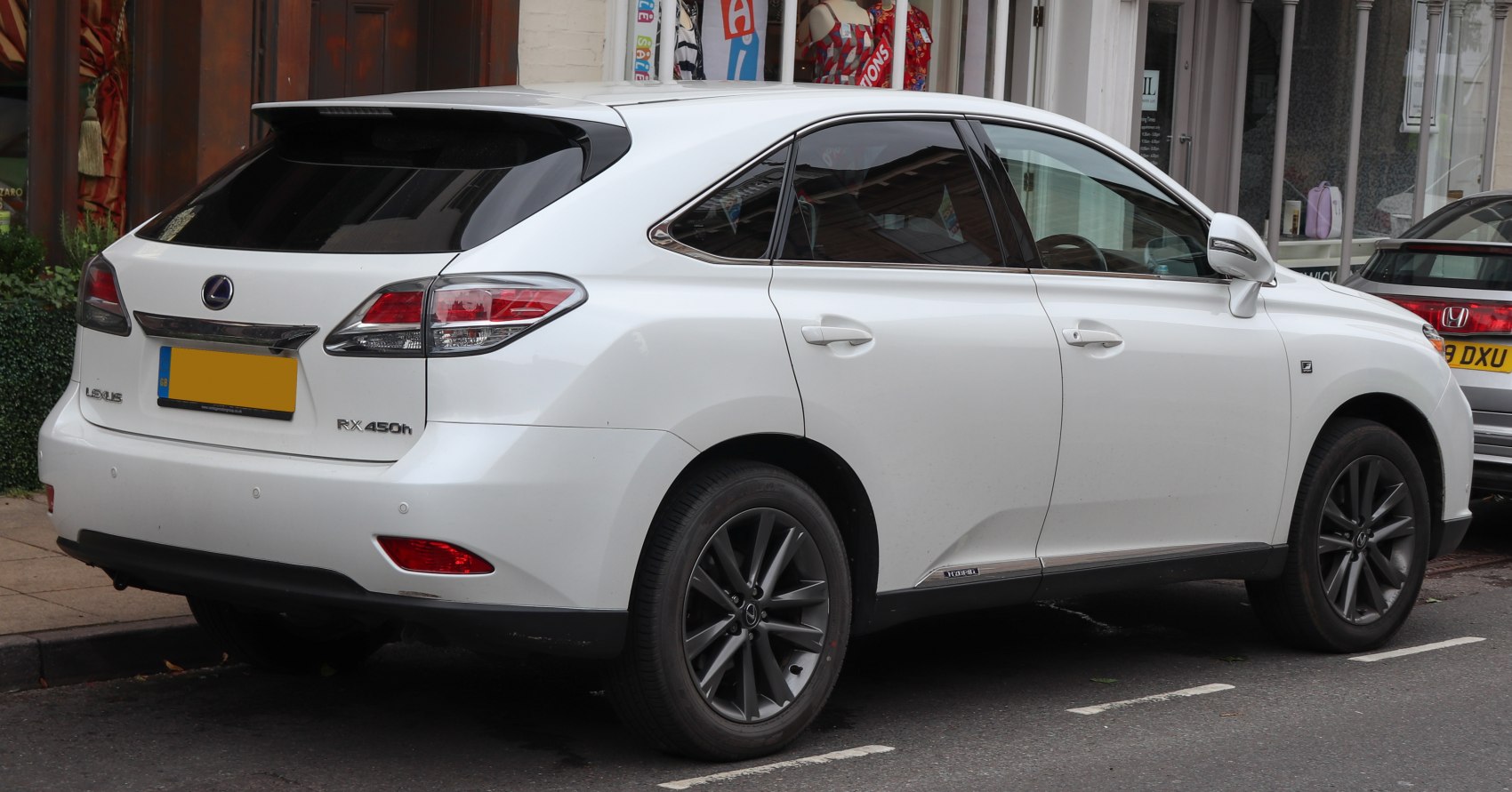 Hybrid SUV rear and side view with alloy wheels
