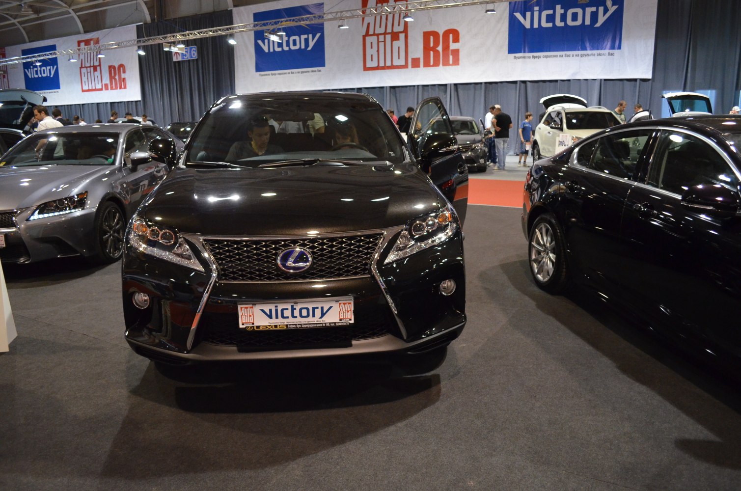 Front view of SUV featuring spindle grille and stylish headlights