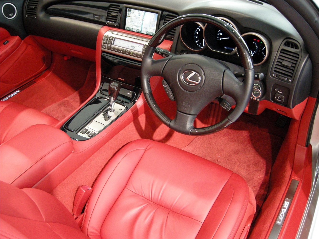 Red leather interior with navigation screen and automatic gear shifter