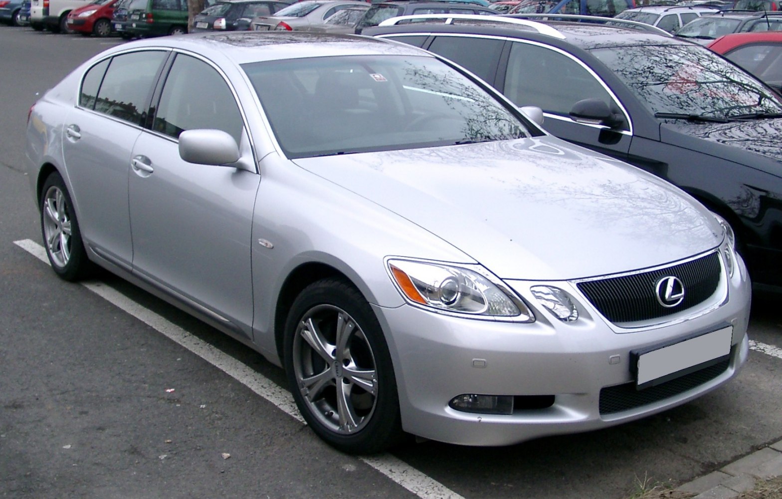 Silver executive sedan with alloy wheels and tinted windows
