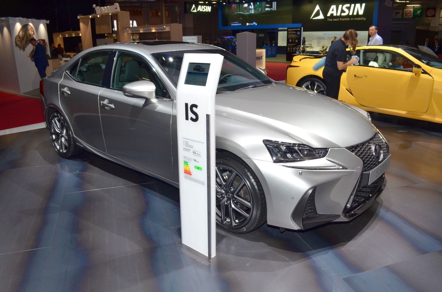 Silver sedan with sporty alloy wheels and sharp headlights