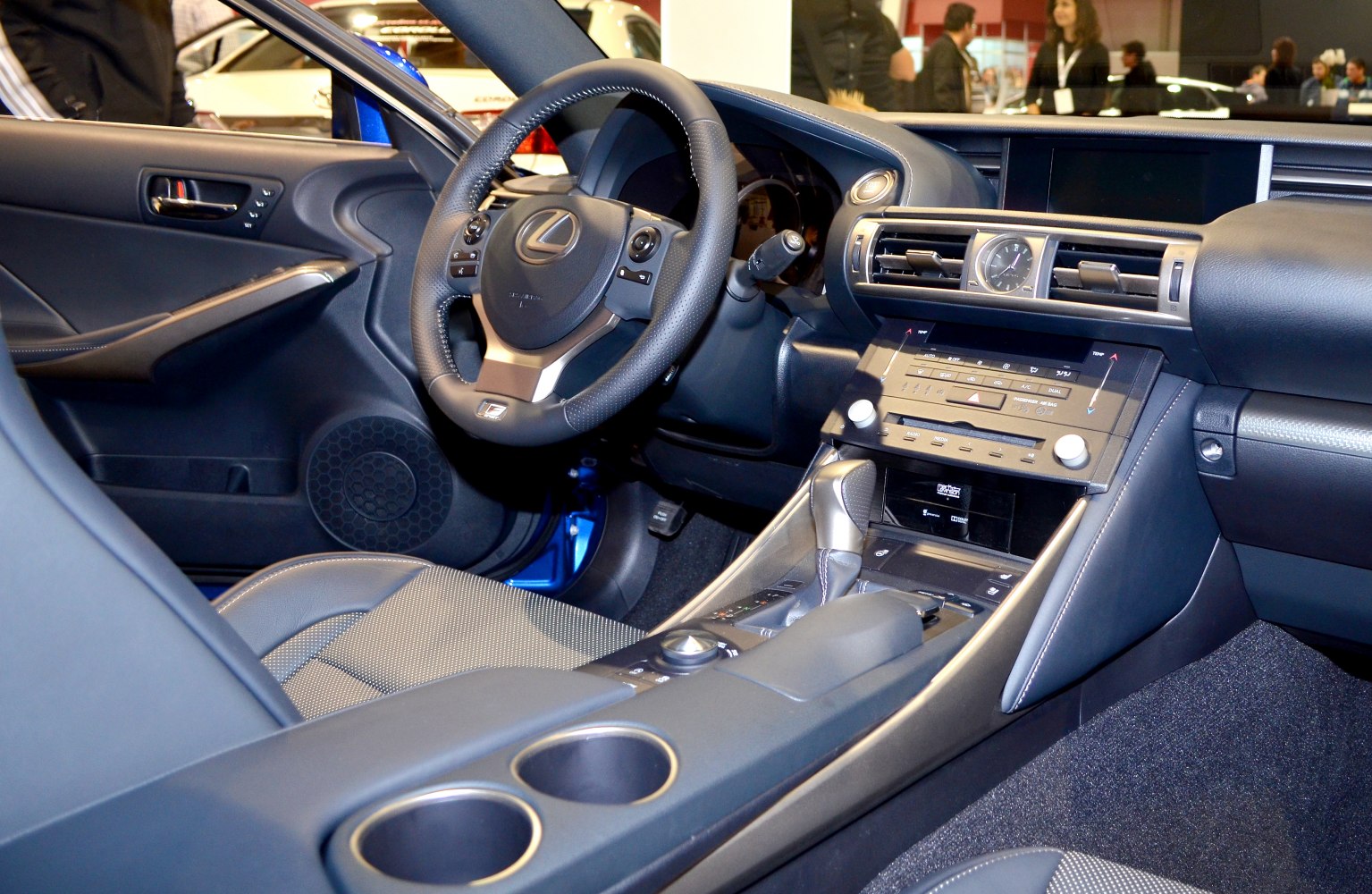 Interior dashboard, steering wheel, and center console layout