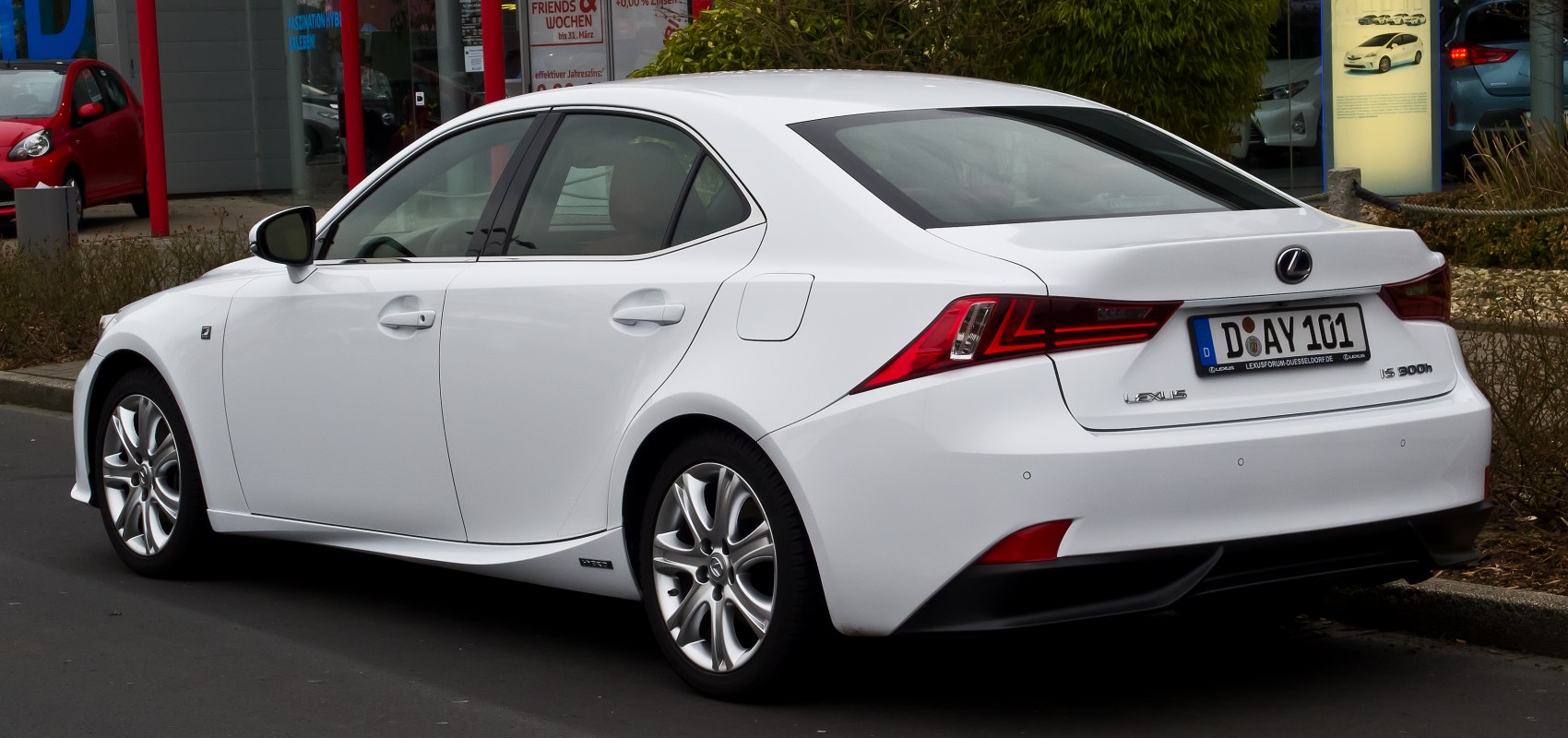 Rear and side view with distinct taillights and sleek sedan profile