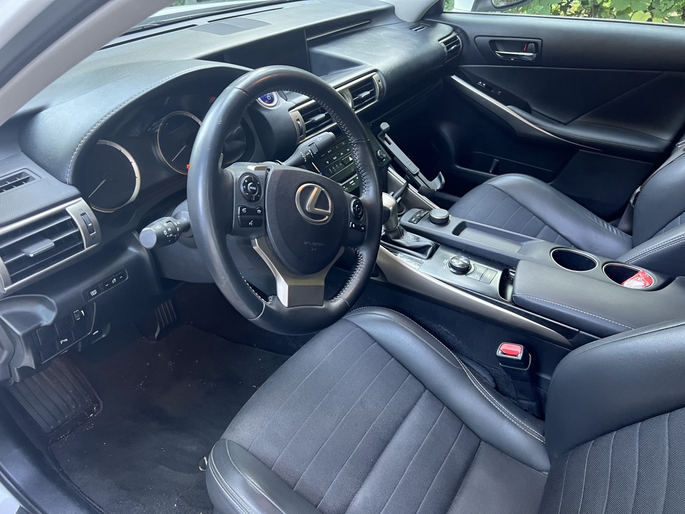 Steering wheel, dashboard, and center console of a modern car interior