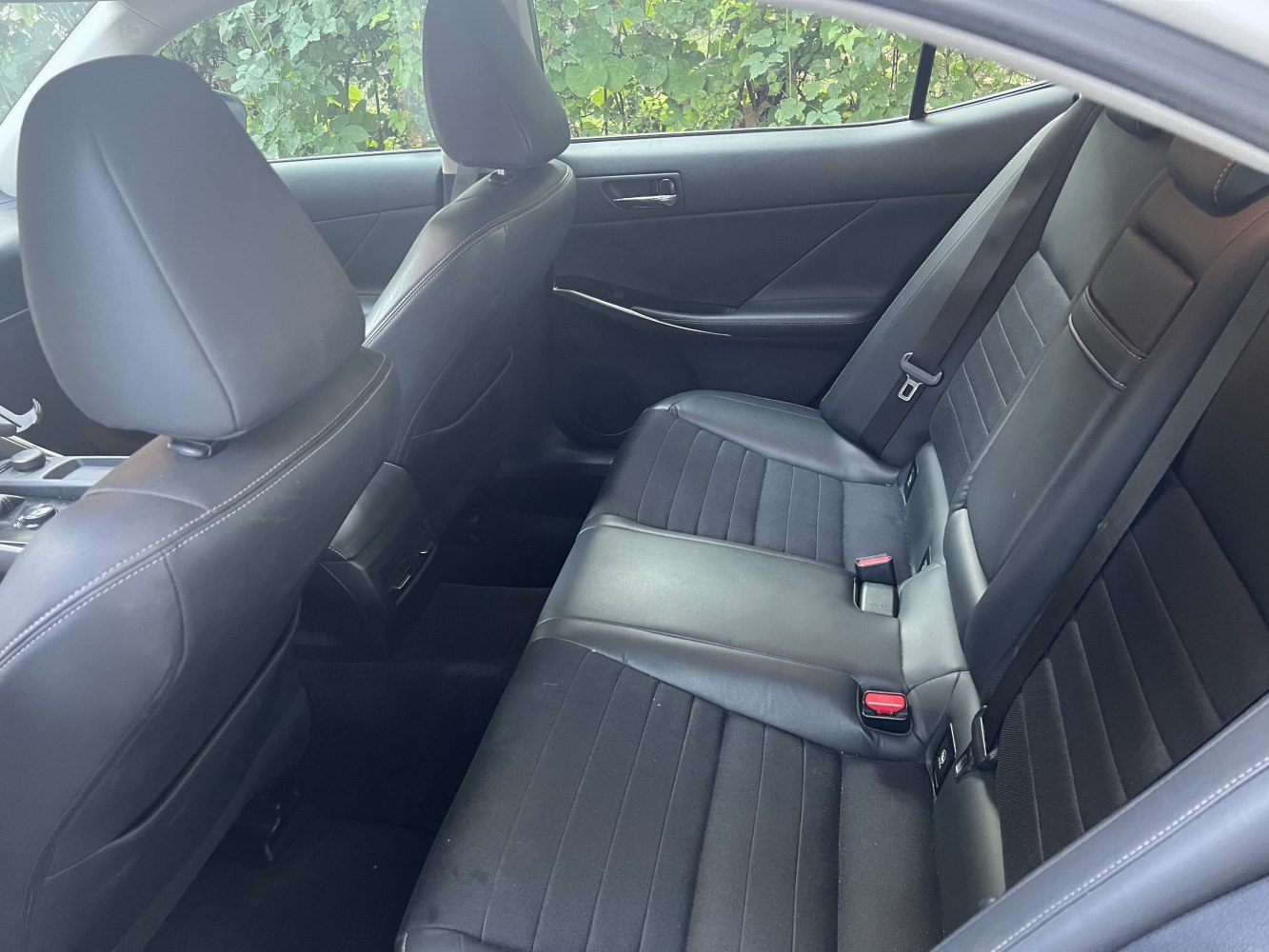 Rear seat with leather/fabric upholstery and seat belts