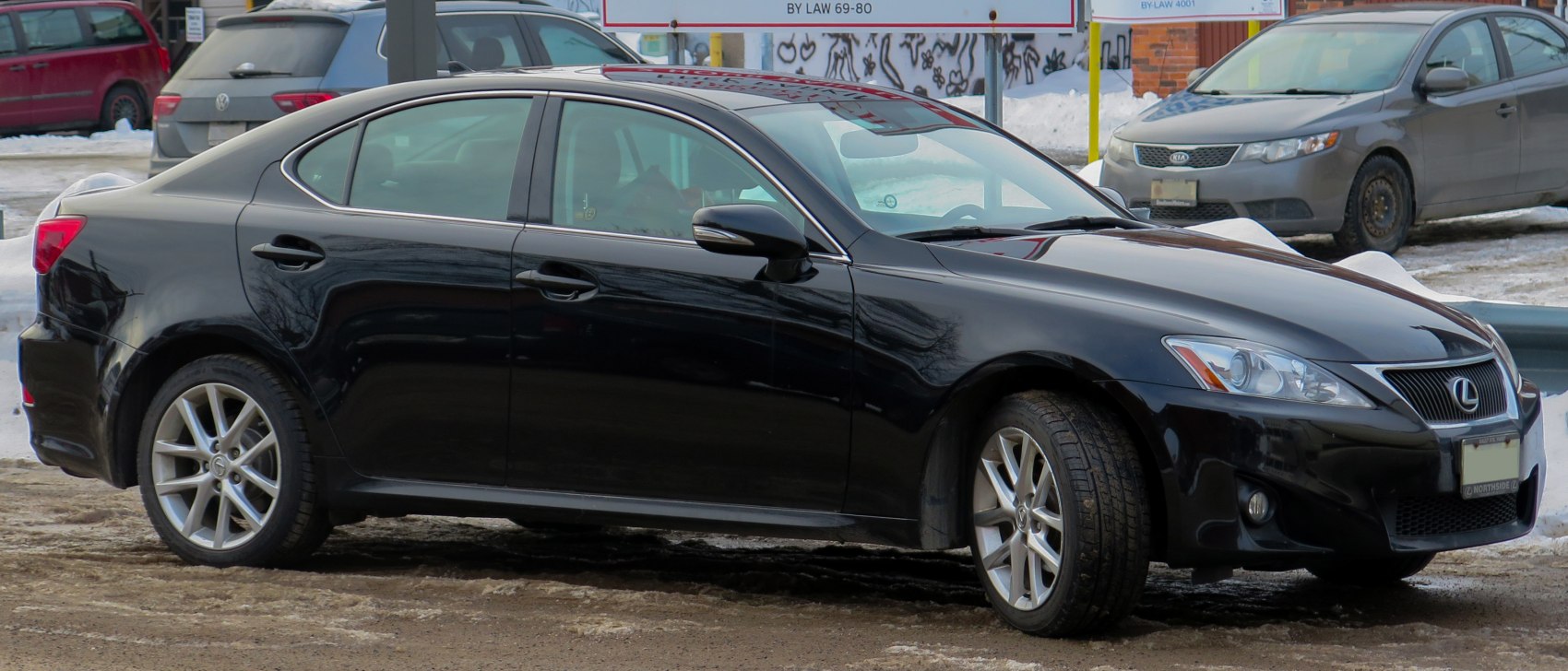 Side view of sleek black luxury sedan with alloy wheels