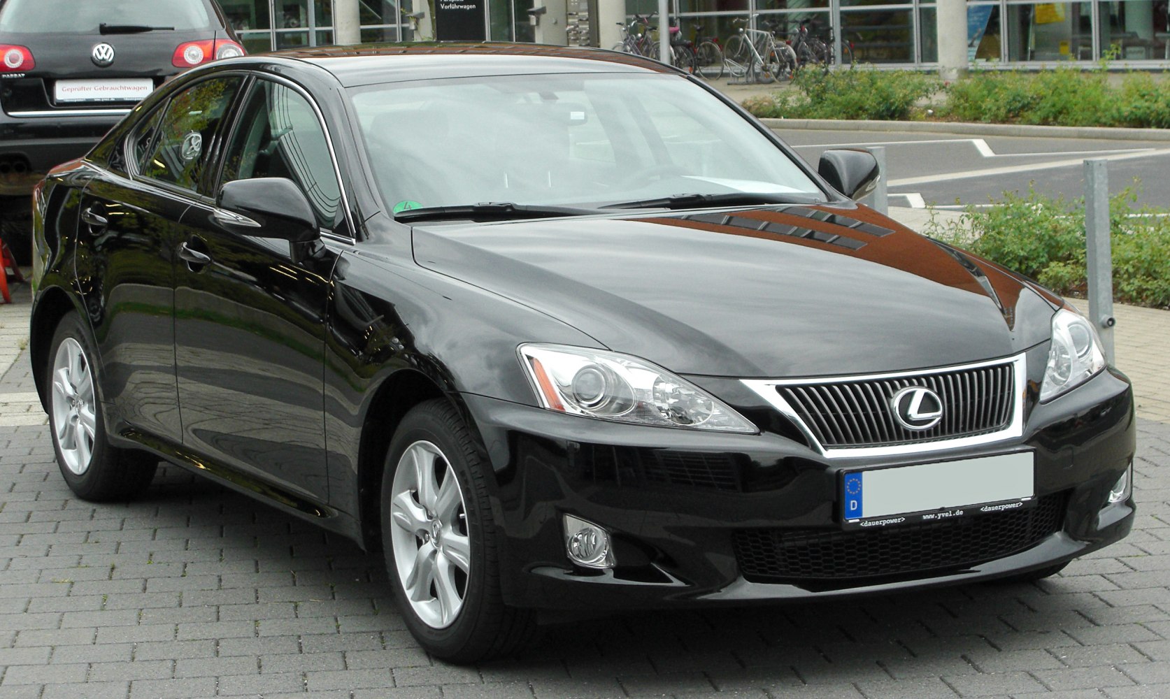 Front grille and headlights of a black sedan