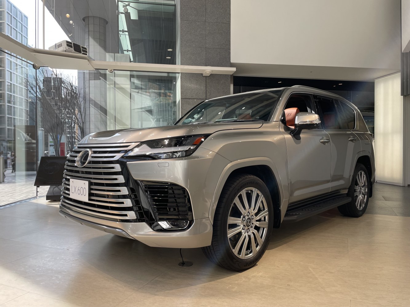 Luxury SUV with prominent front grille and sleek LED headlights
