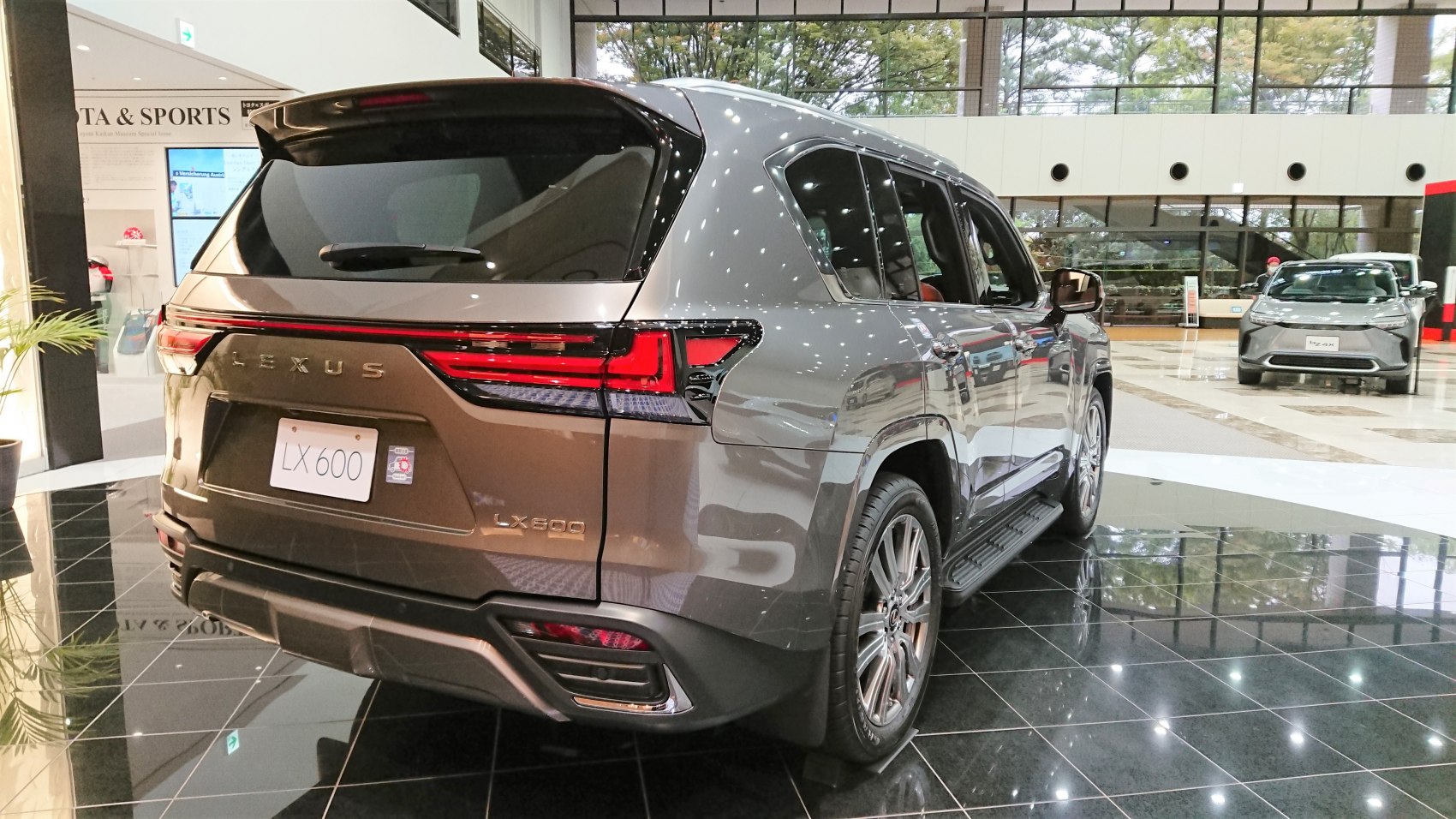 SUV rear with LED taillights, rear spoiler and integrated bumper
