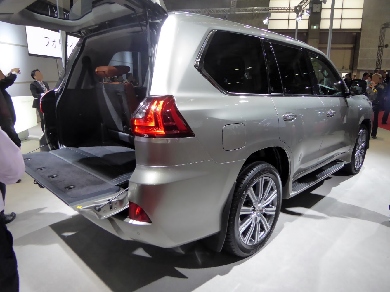 Open rear cargo area with split tailgate and LED tail lights