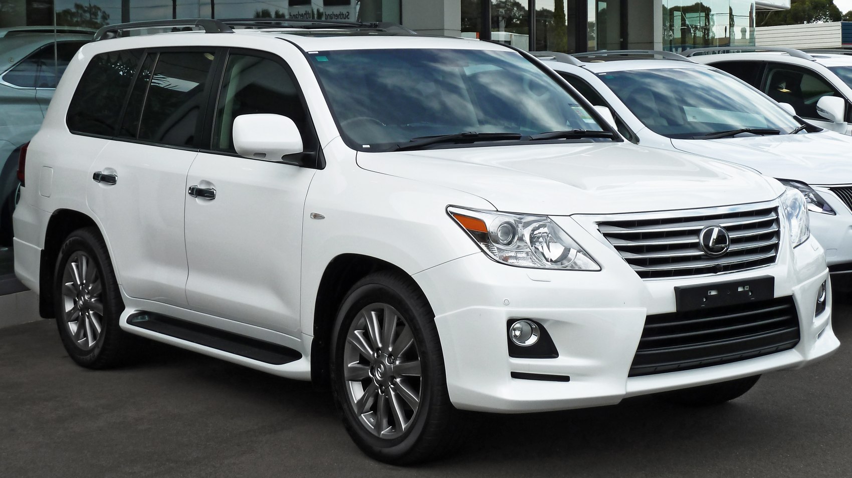 Bold front grille and sleek alloy wheels on luxury SUV