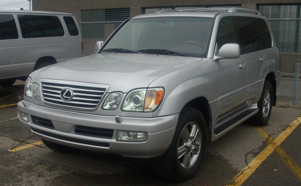 Silver SUV front and side view with signature grille and headlights