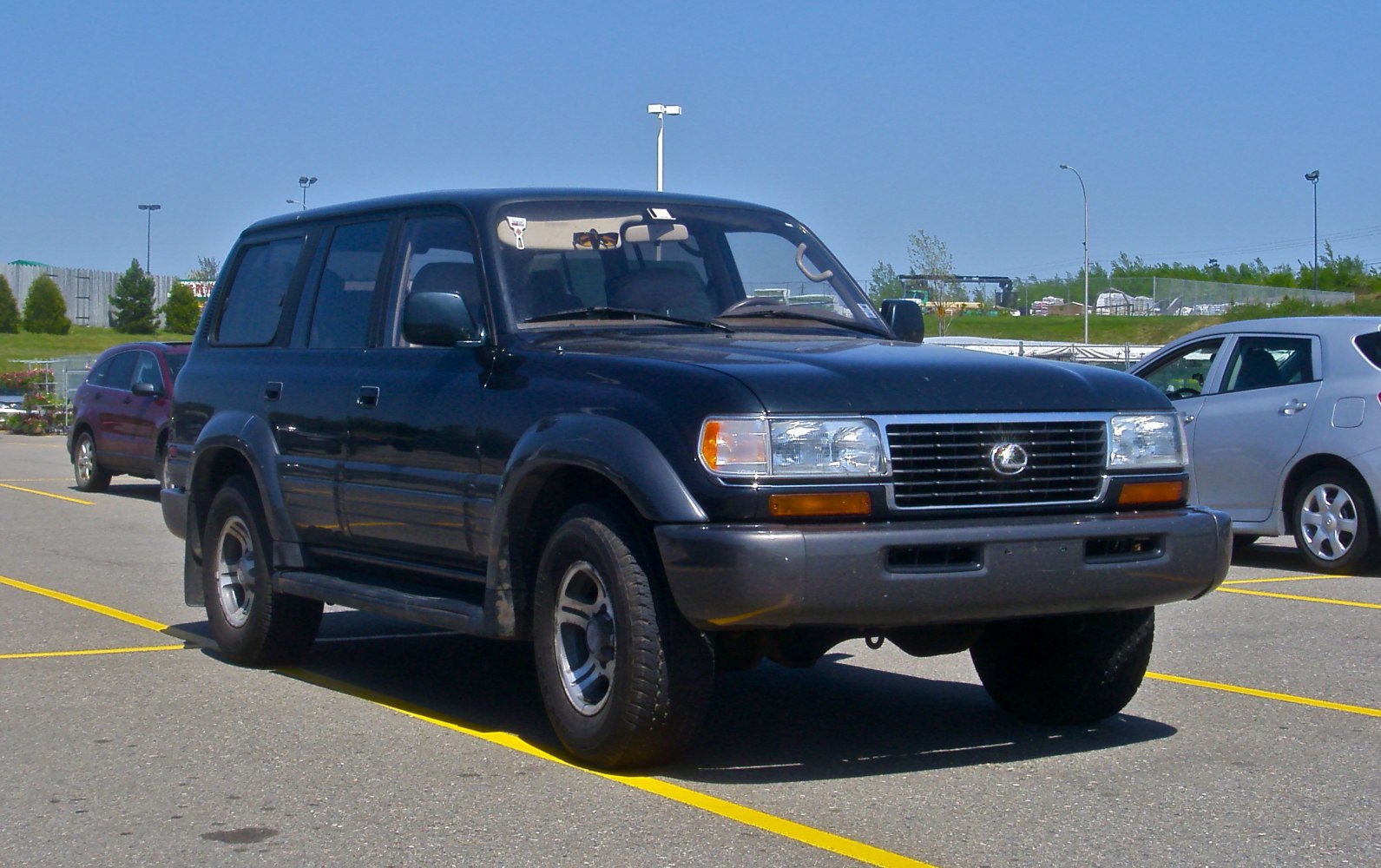 Vintage SUV front side view with distinctive grille and rugged tires