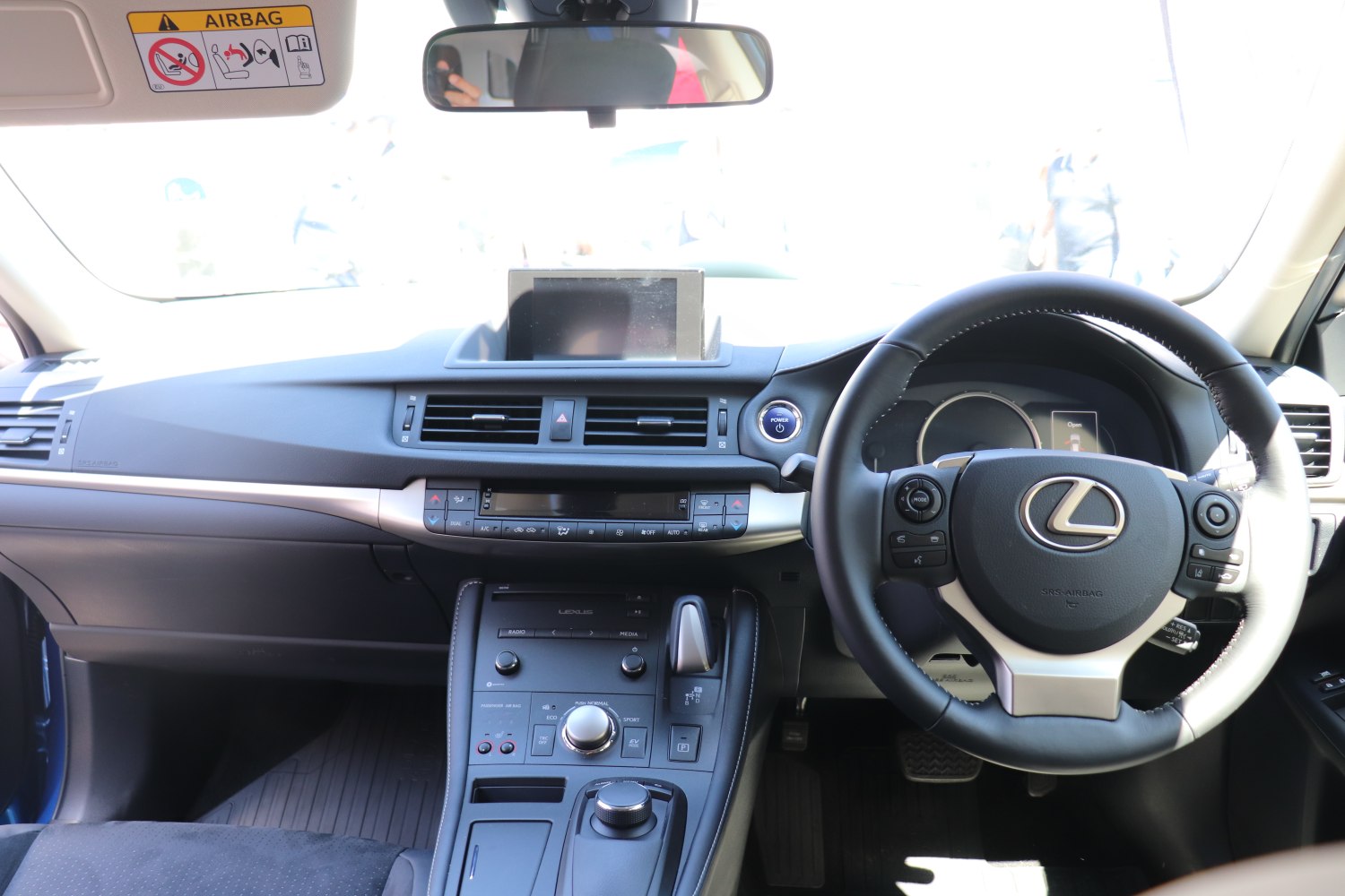 Dashboard, infotainment display, steering wheel with controls
