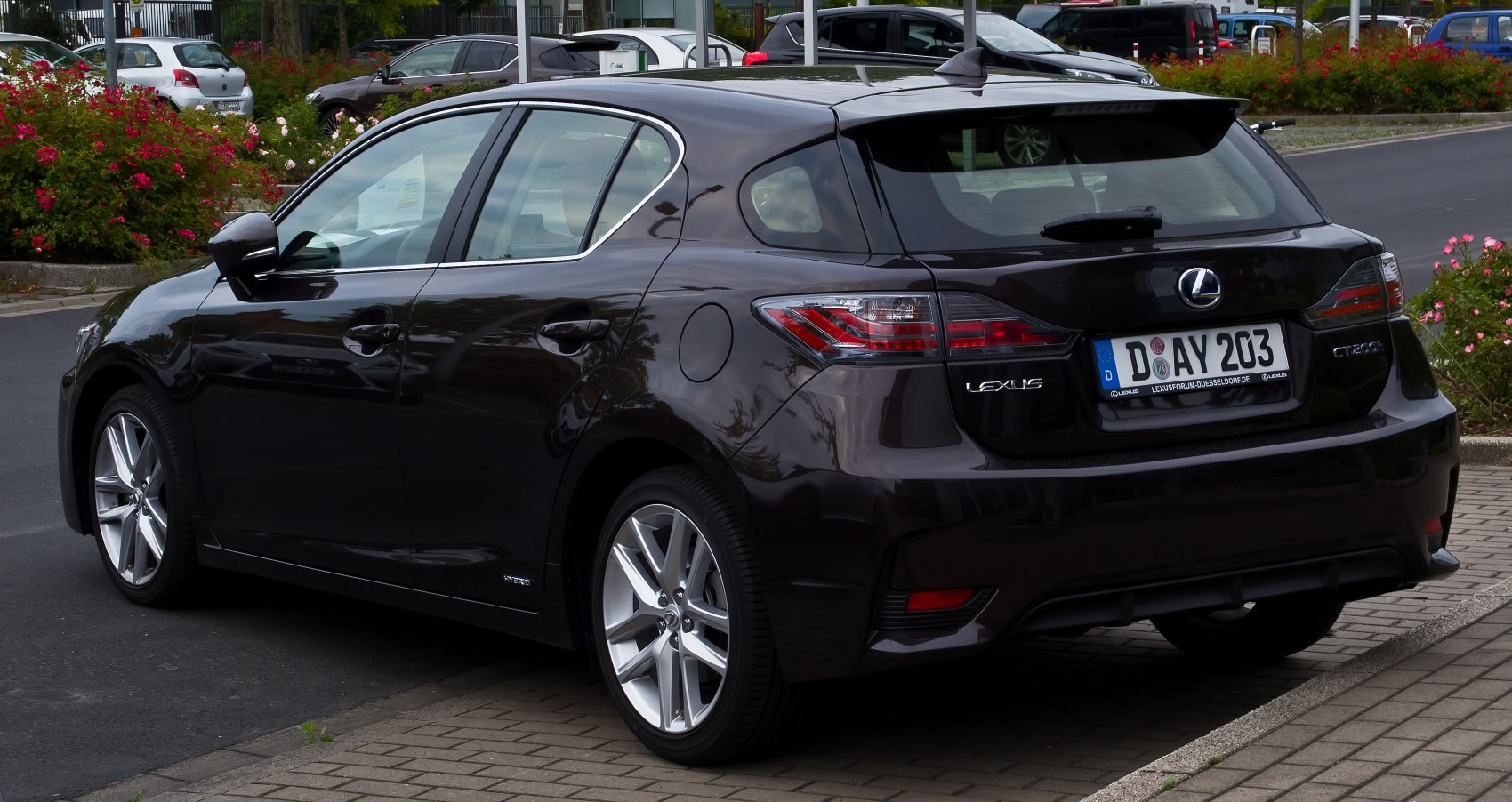 Rear and side profile with hybrid badge and alloy wheels
