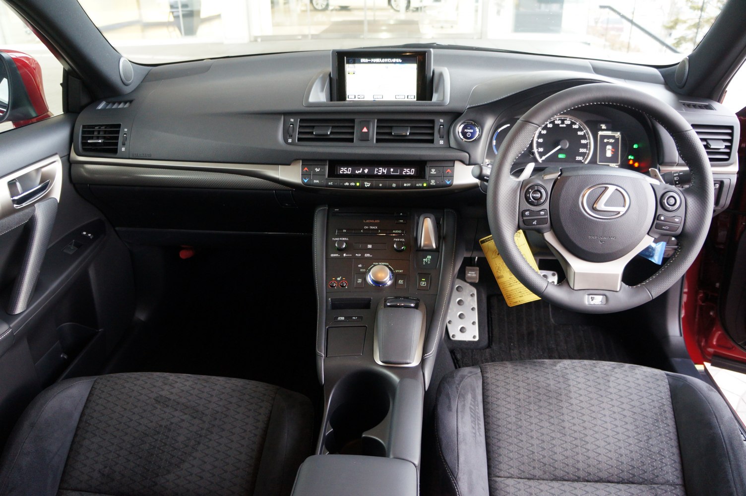 Dashboard and multifunction steering wheel with infotainment display