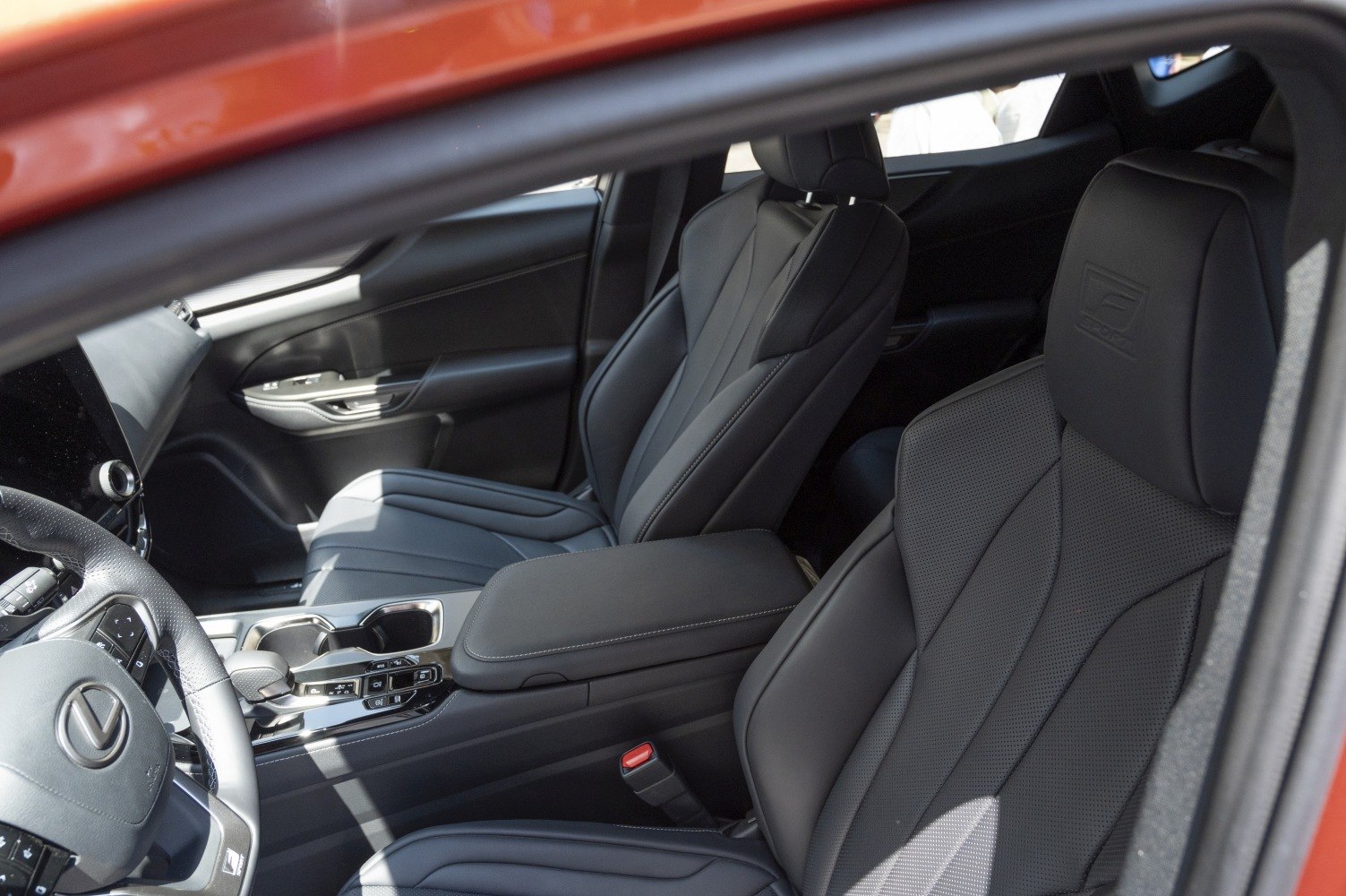 Luxury F SPORT leather seats and central console with controls.