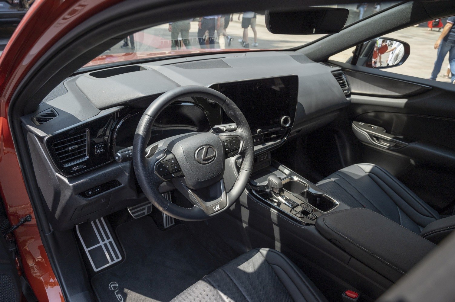 Modern luxury SUV interior with dashboard and multifunction steering wheel