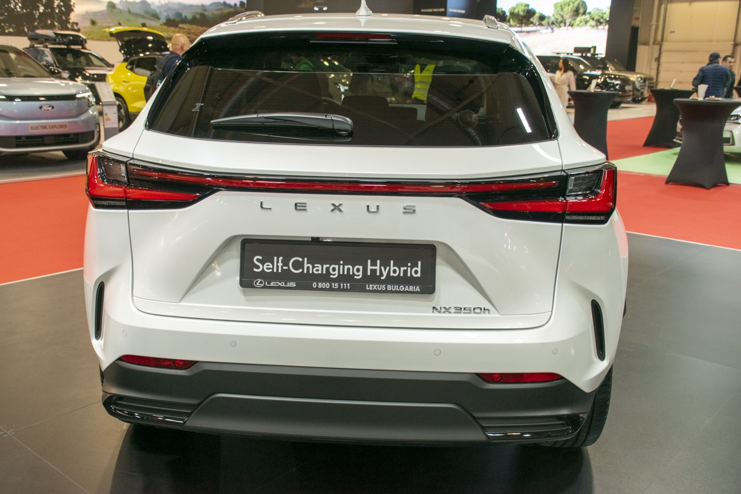 Rear view with sharp LED taillights and hybrid badge