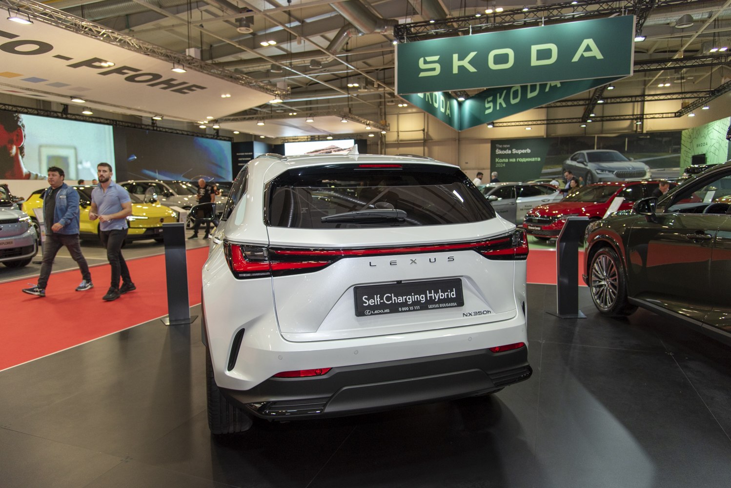 Rear view of hybrid SUV with modern tail lights and self-charging badge