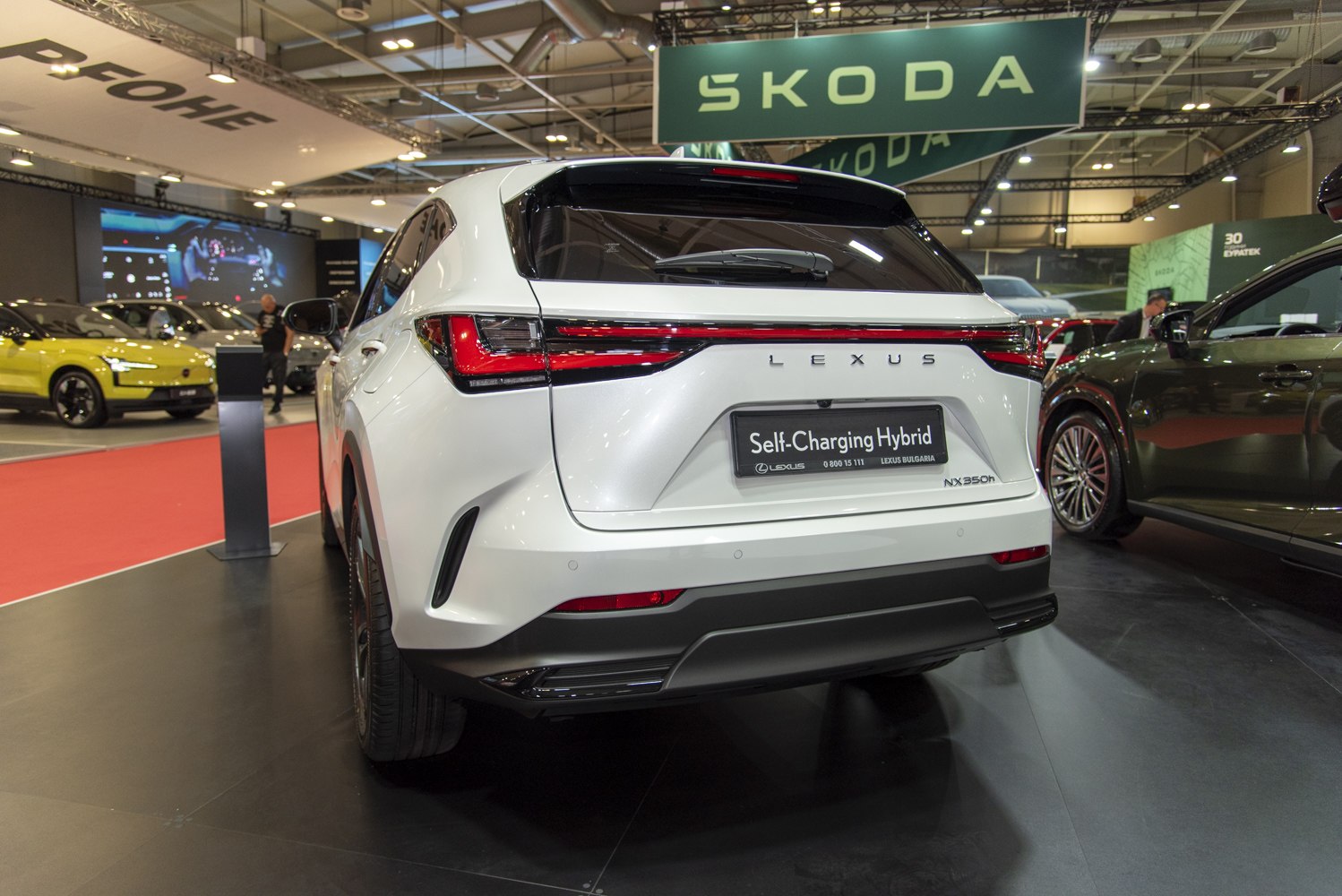 Rear view with distinctive taillights and hybrid badge