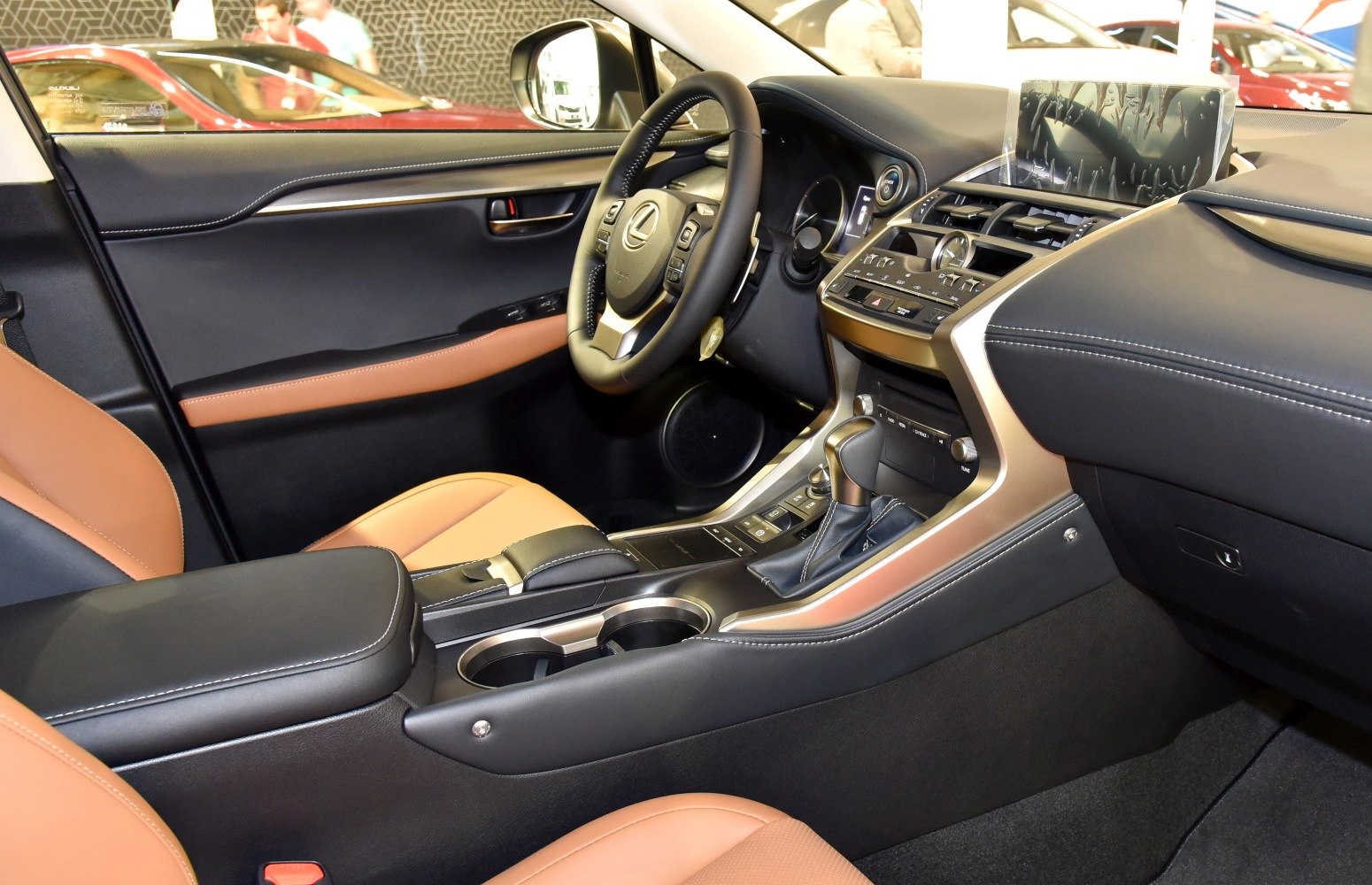Premium dashboard and steering wheel with leather seats in car interior