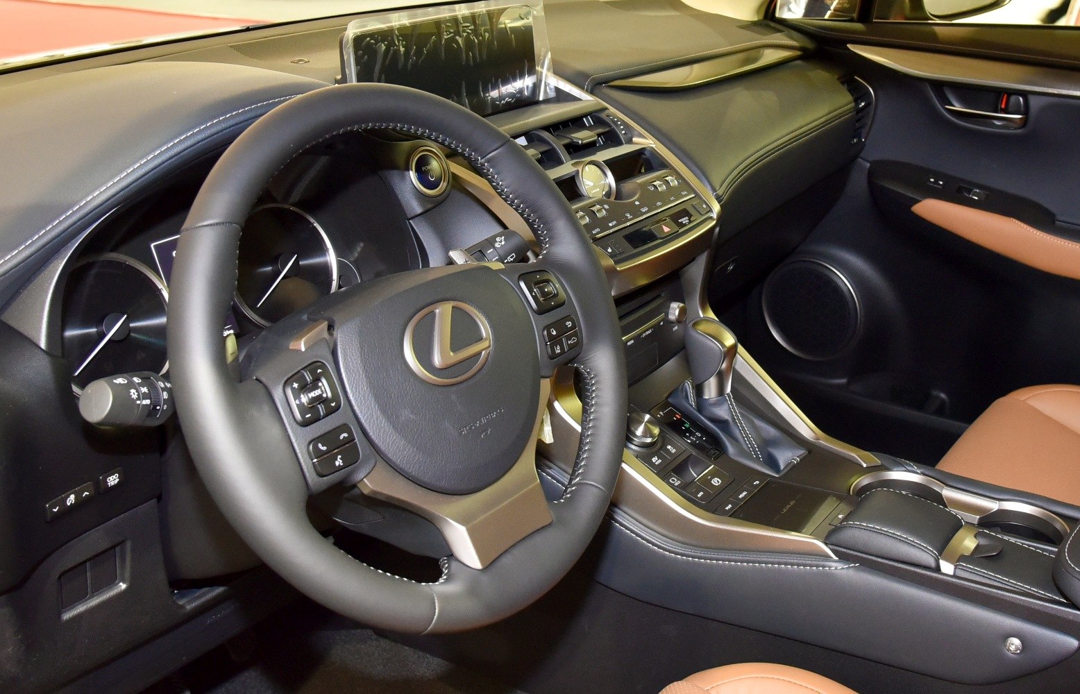 Steering wheel and center console of a modern vehicle interior