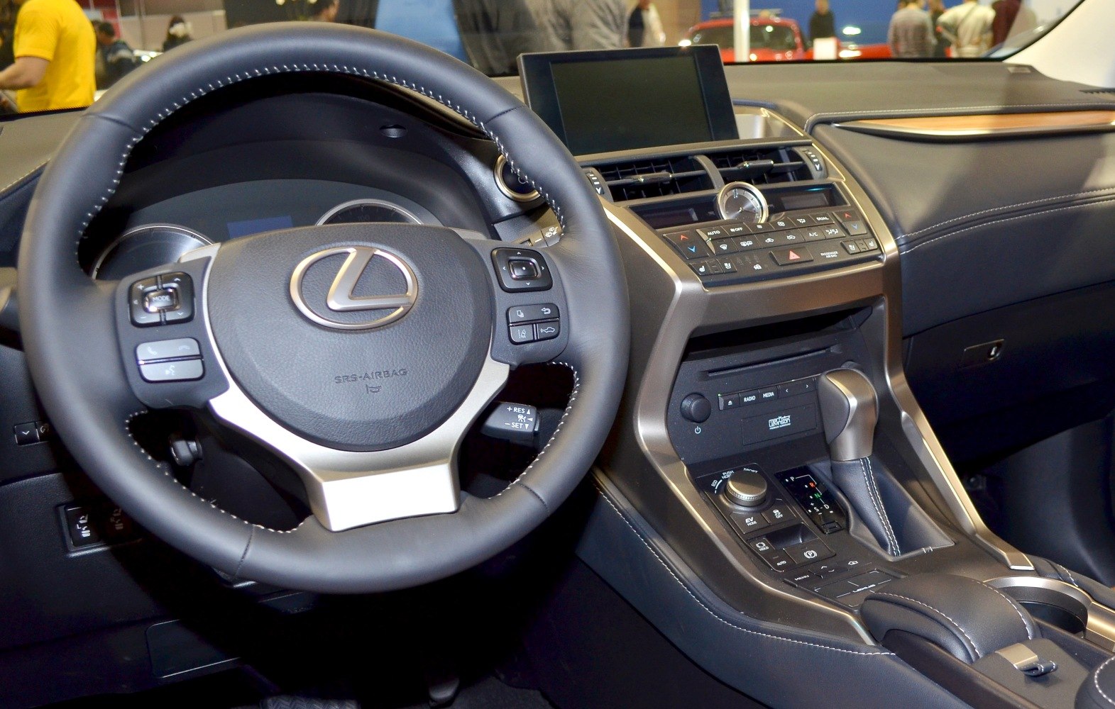 Leather steering wheel and detailed center console with controls