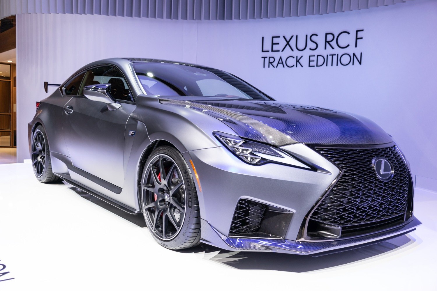 Carbon fiber hood and black sporty alloy wheels