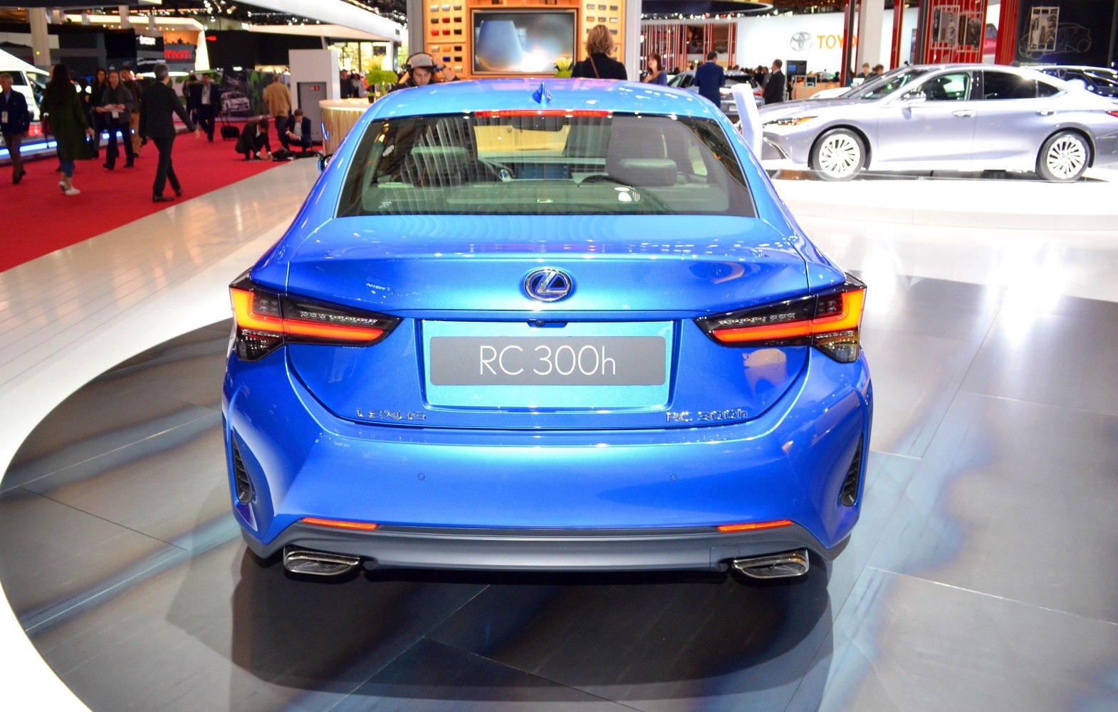 Blue car rear with LED taillights and dual exhaust tips