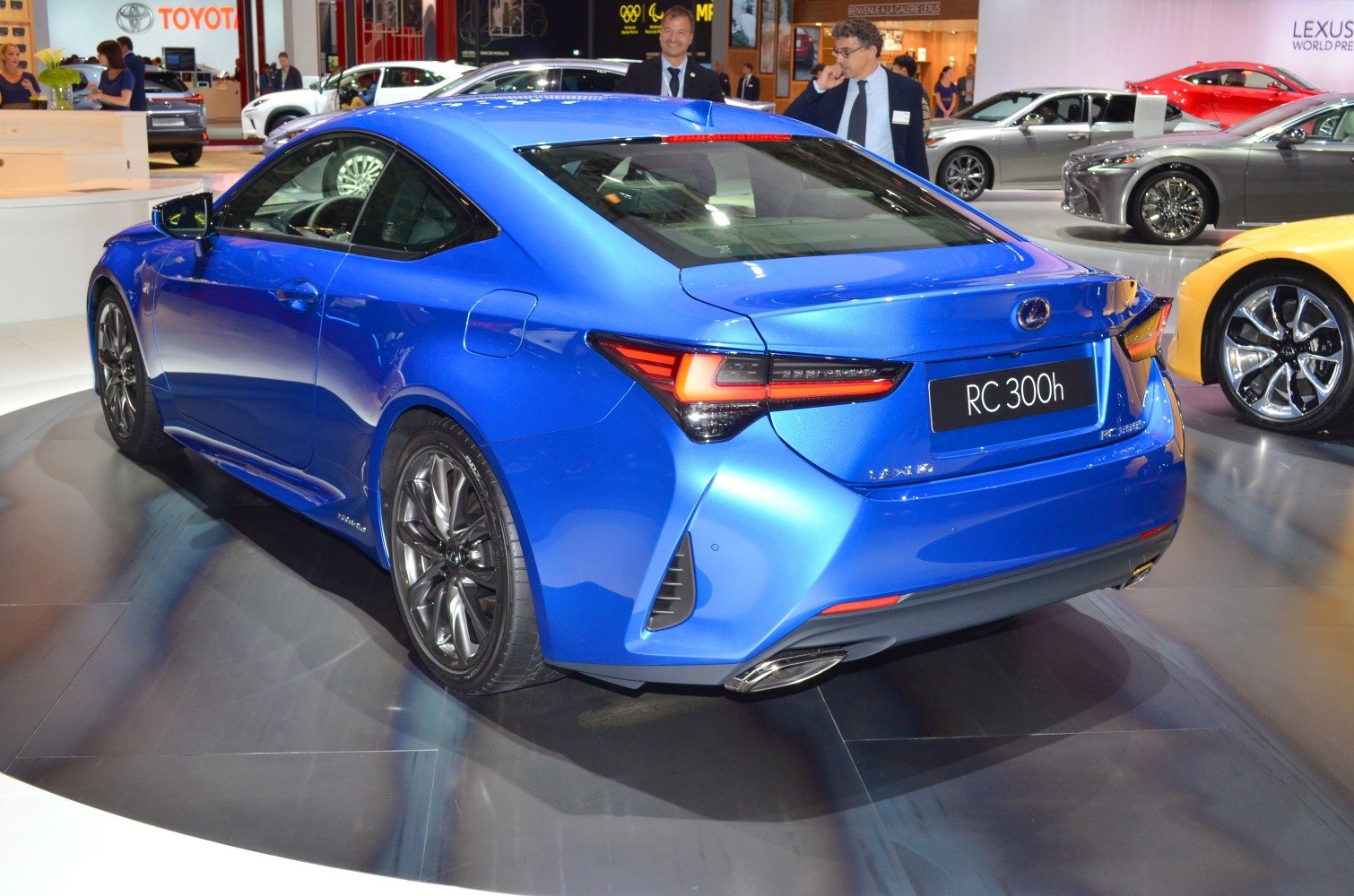 Blue coupe rear with modern taillights and sporty dual exhausts