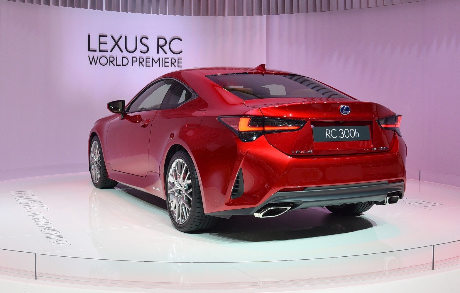 Rear view of coupe with LED taillights and dual exhausts