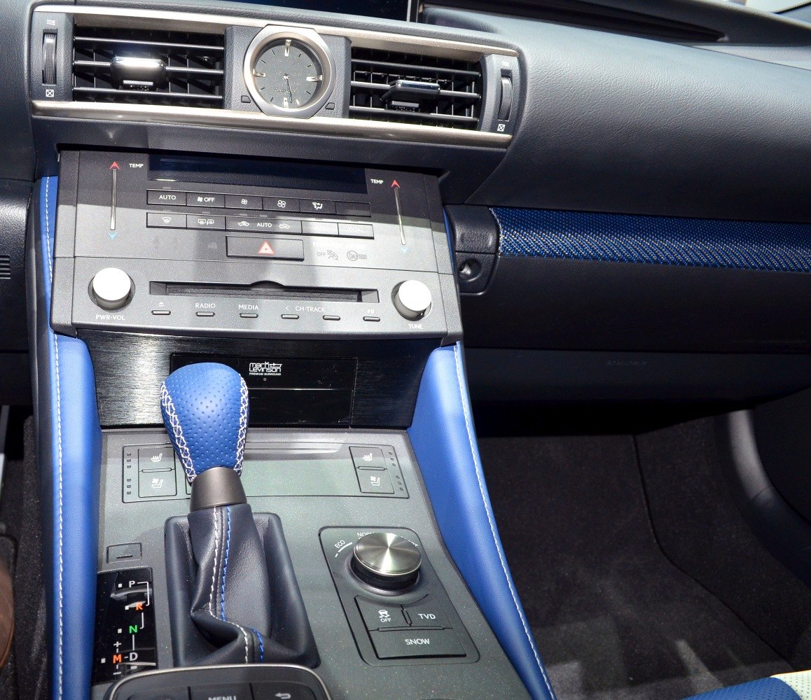 Blue leather shift knob, center console with climate controls and analog clock