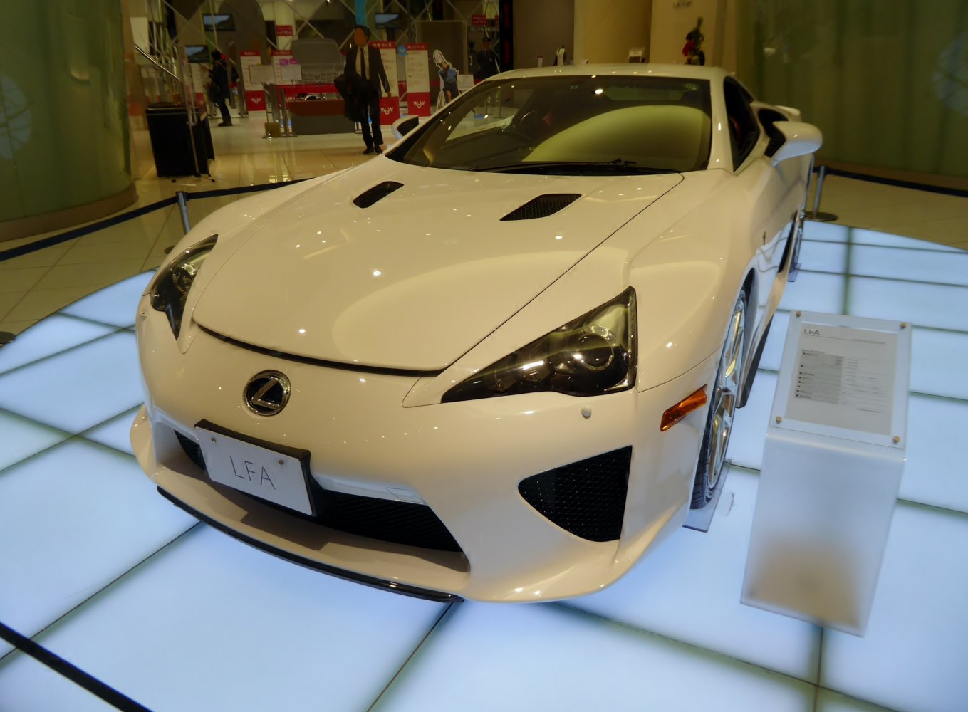 Front view with aerodynamic hood vents and sharp headlights