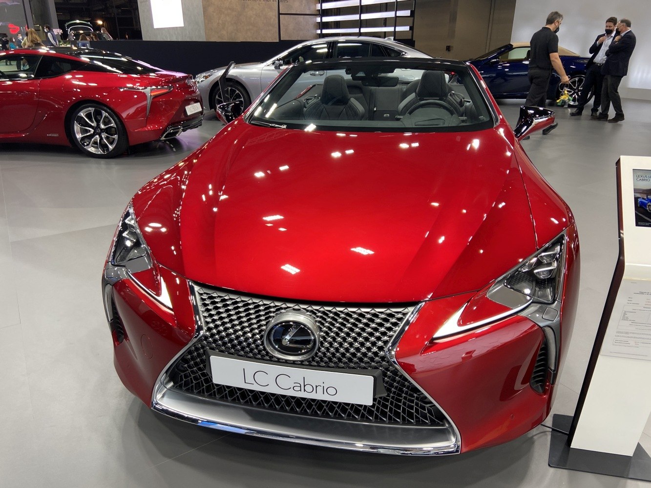 Convertible sports car front grille and headlights with open roof