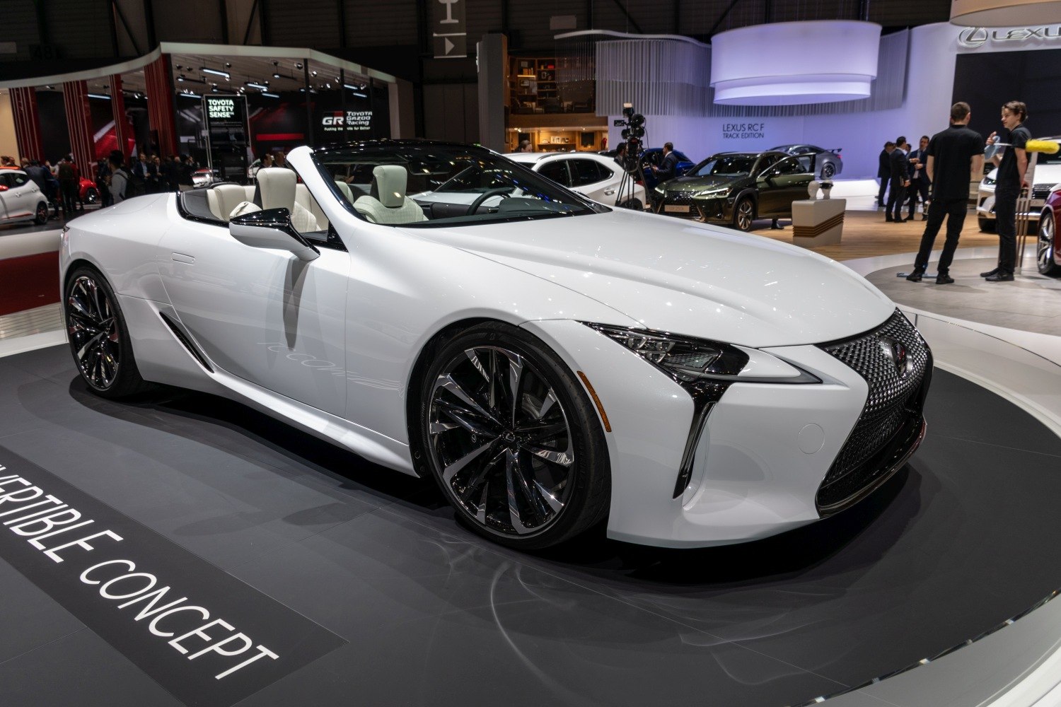 Front and side view of luxury convertible with sporty wheels and sharp headlights