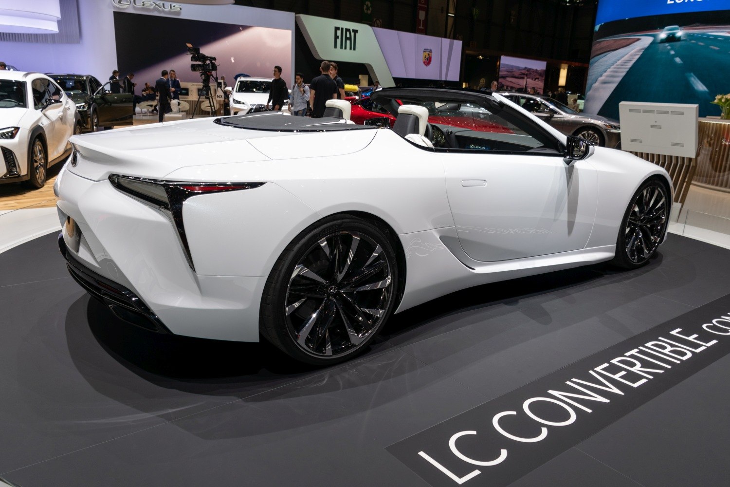 White convertible with sleek rear design and open roof