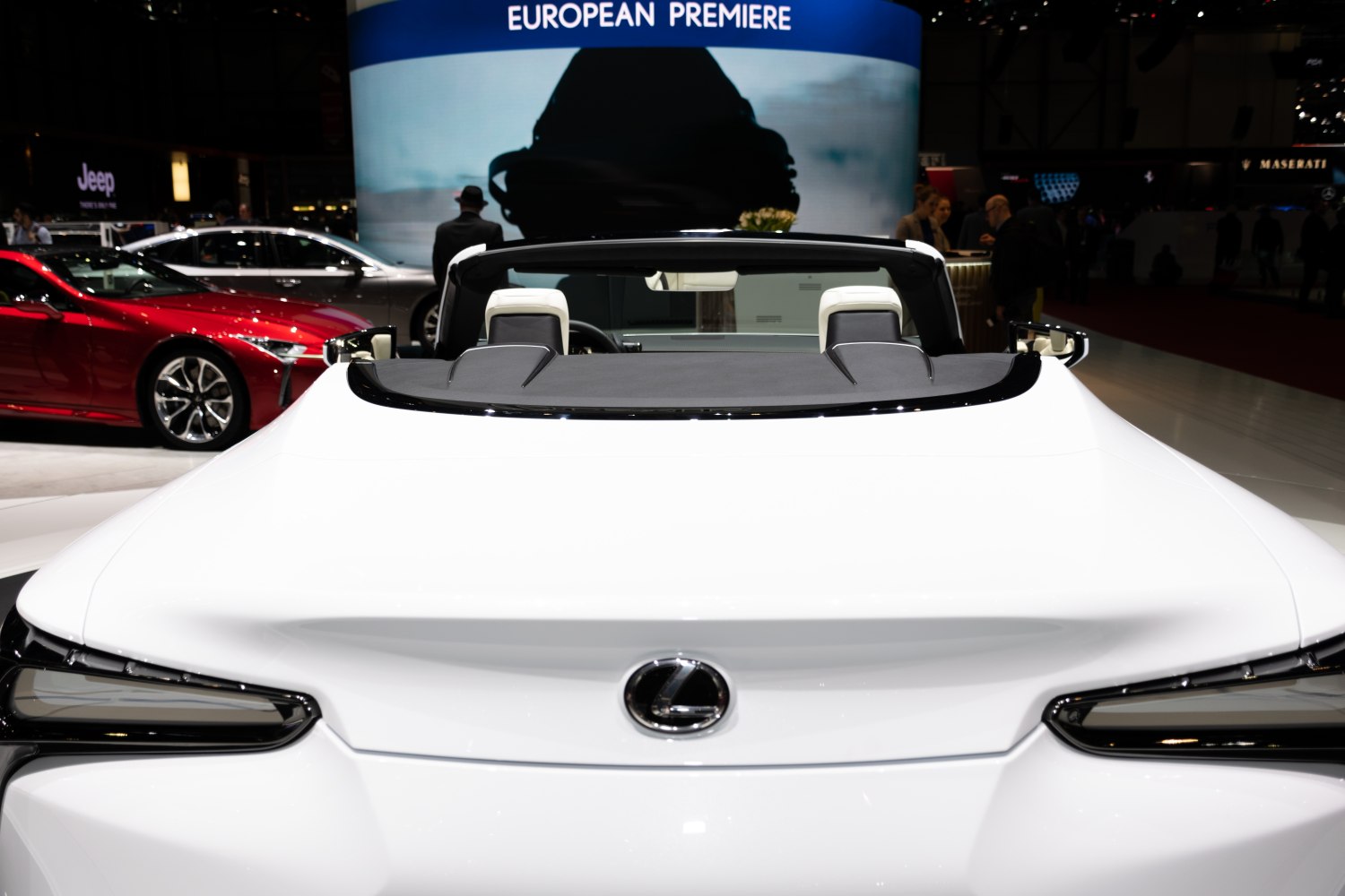 Convertible rear view with distinctive taillights and Lexus emblem