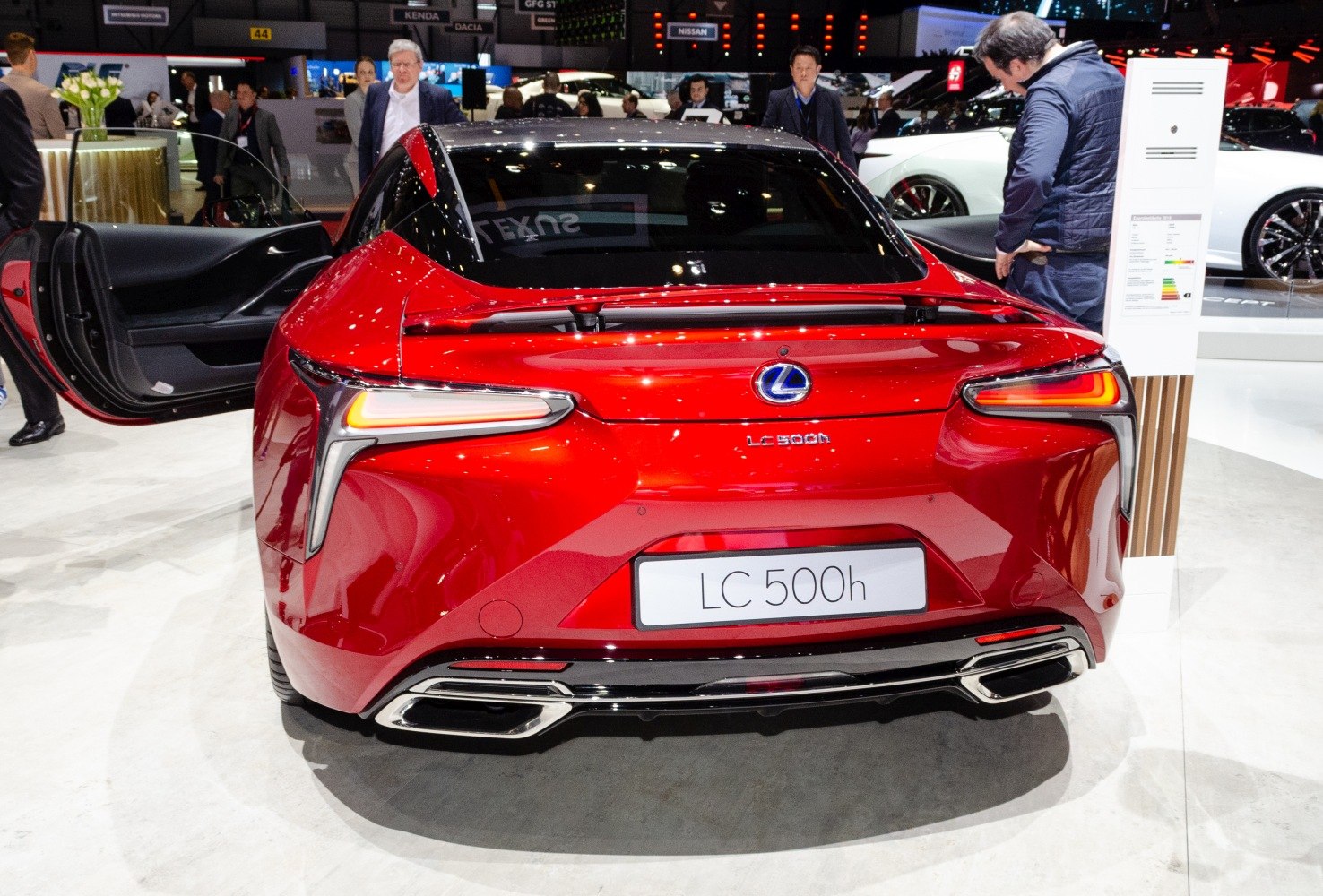 Red Lexus car rear with LED taillights and dual exhaust