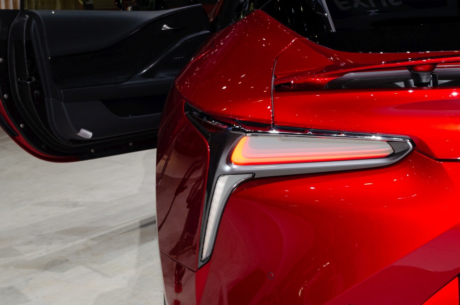 Close-up of modern rear LED tail light with sleek body curve