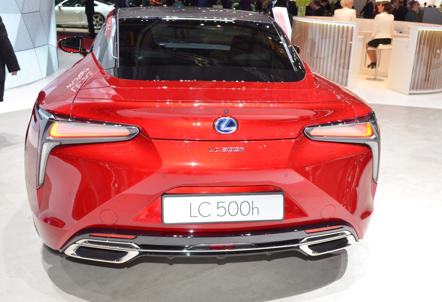 Sleek rear design with angular tail lights and dual exhaust tips.