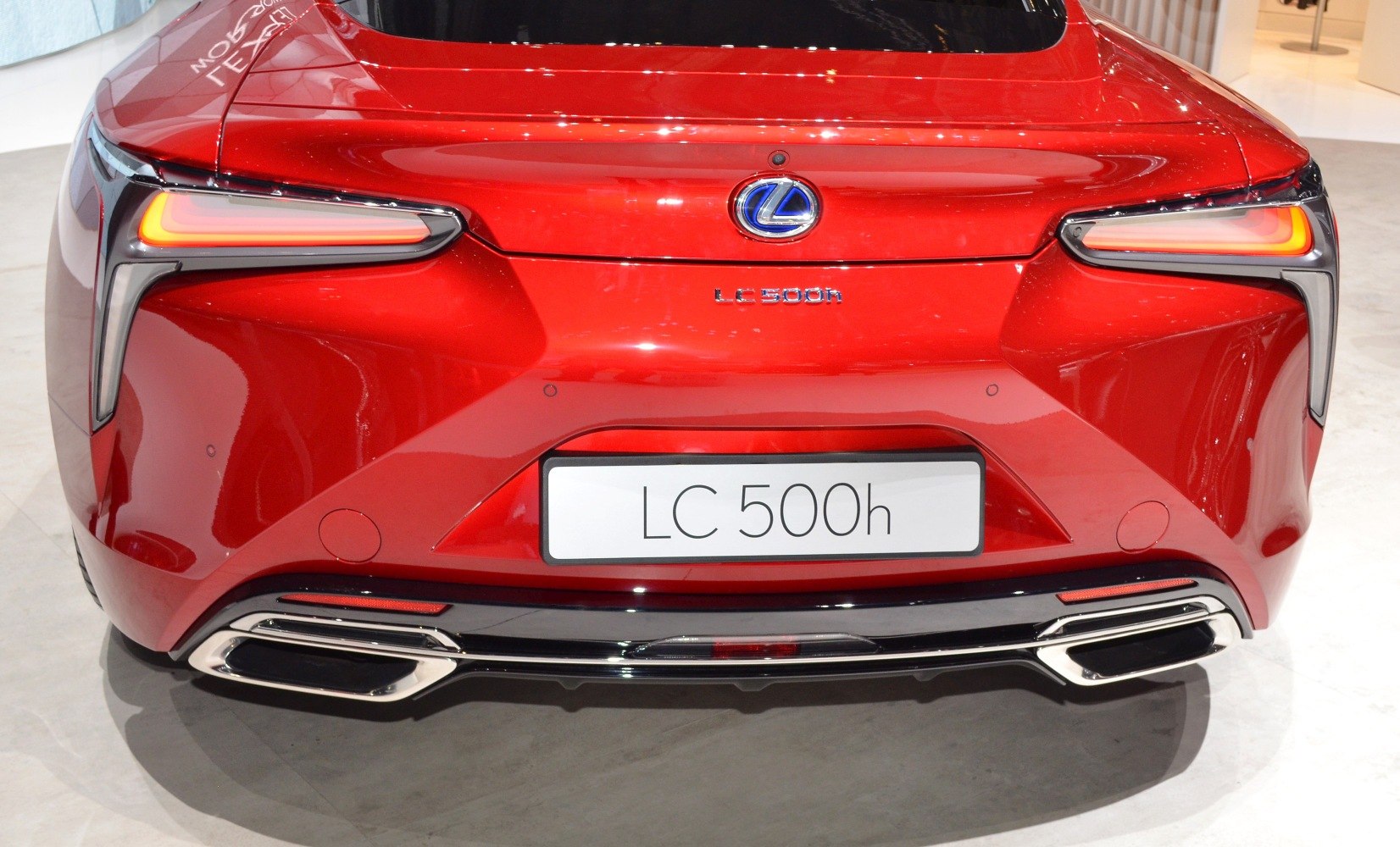 Rear end with distinctive L-shaped tail lights and dual exhaust outlets