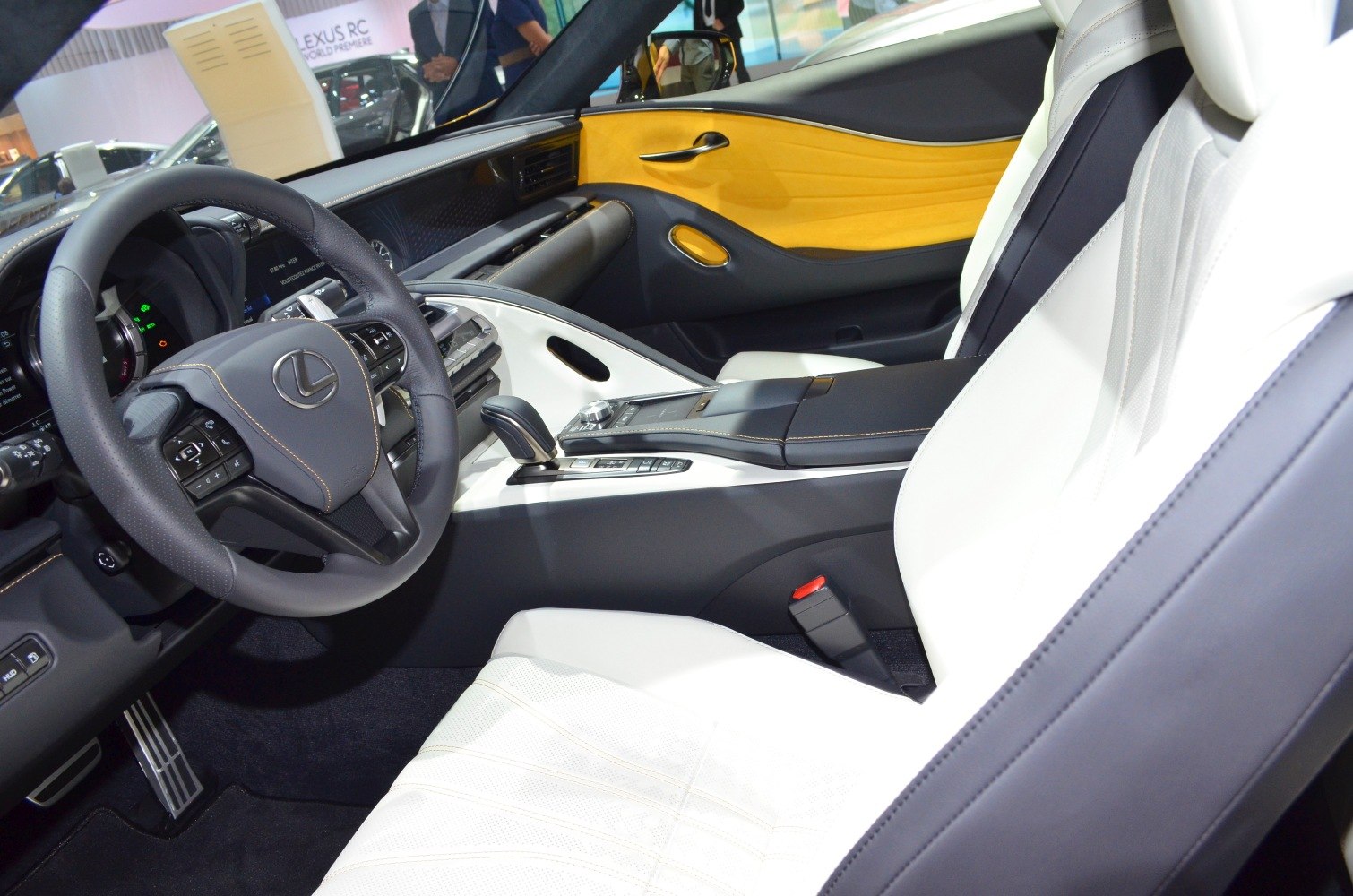 Luxury car interior with multifunction steering wheel and ergonomic seats