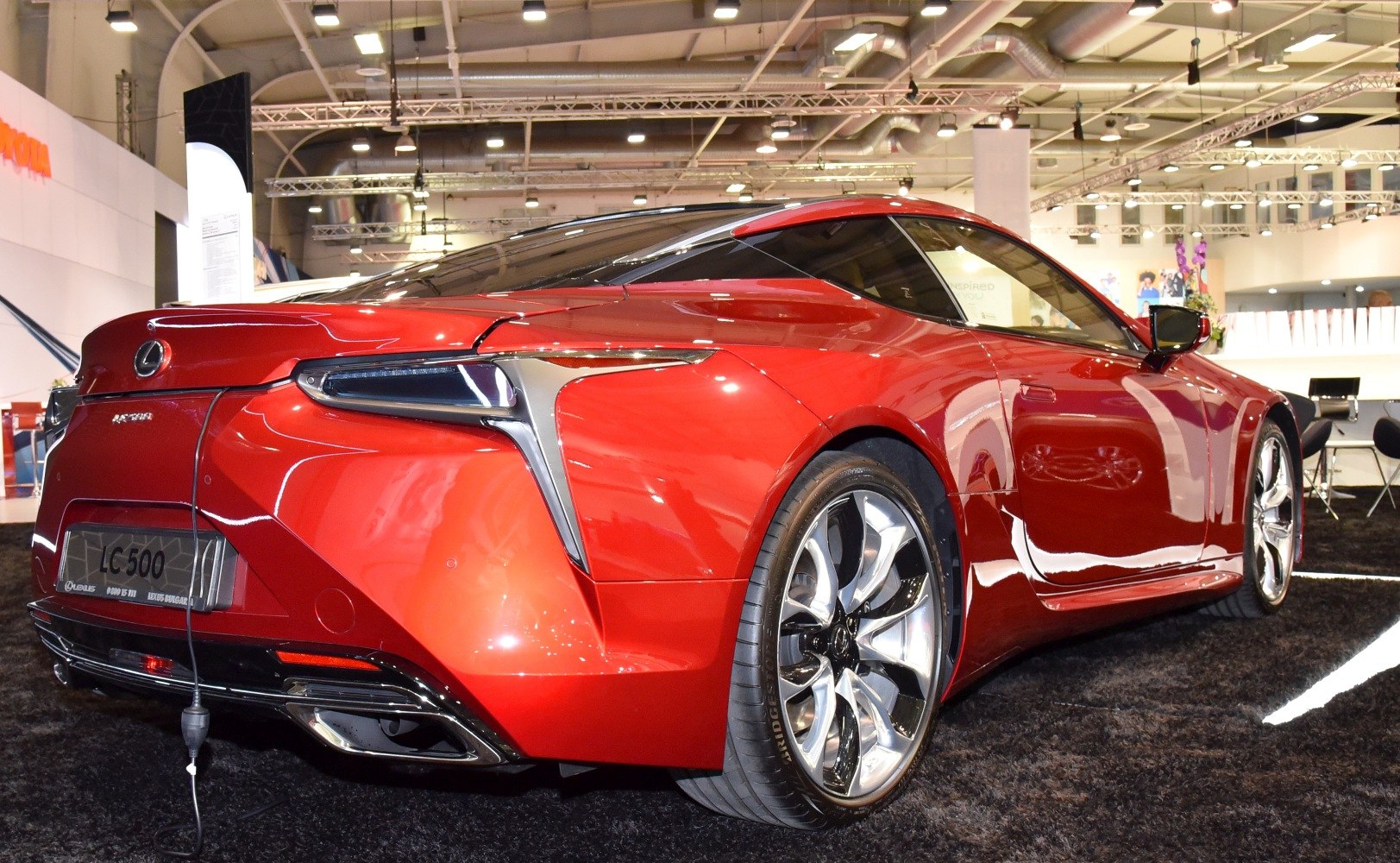 Sleek rear design with distinctive tail lights and alloy wheels