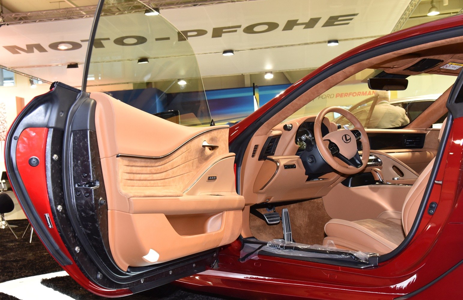 Beige leather luxury interior with ergonomic steering and door panel design