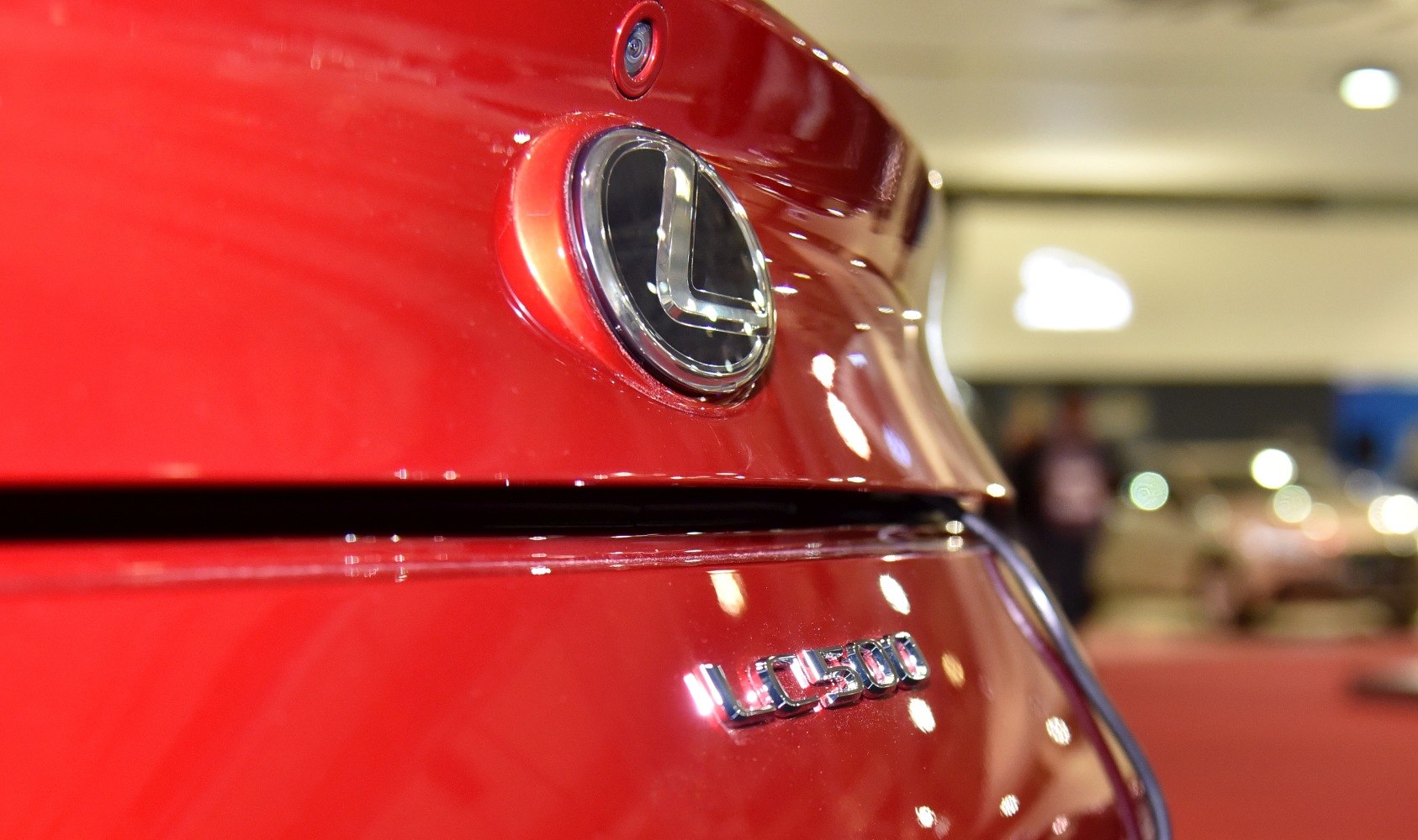 Close-up of Lexus emblem and LC 500 badge on a car's rear
