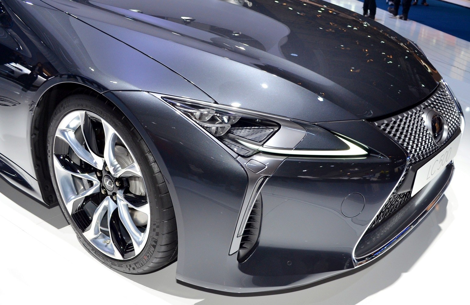 Detailed front view showing headlight and alloy wheel design