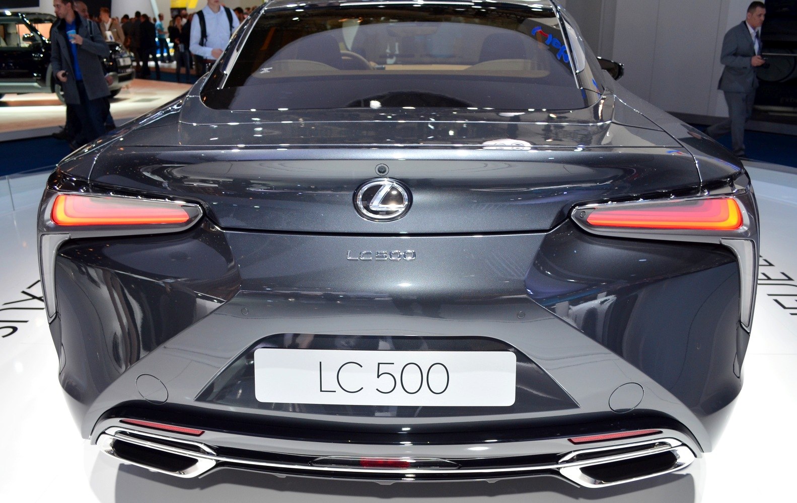 Rear view with distinctive LED tail lights and exhaust outlets