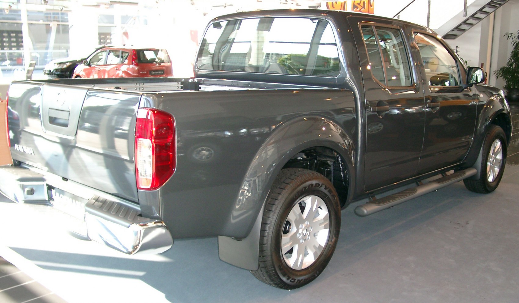 Rear and side view of pickup with alloy wheels and double cab
