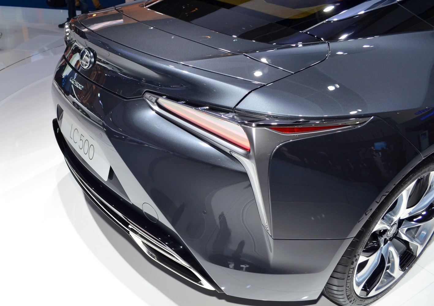 Sleek rear design with prominent tail lights and sporty wheel